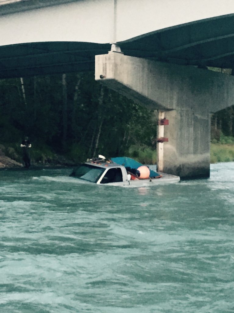 Kasilof River truck submerged under Kasilof river bridge drift boat